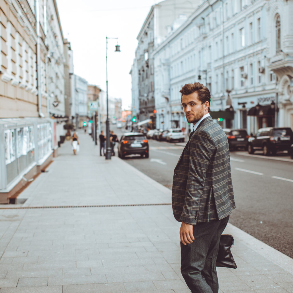 the man in the suit walks